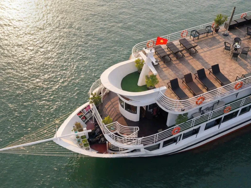 Authentic Lan Ha Bay Cruise boat sailing through limestone karsts