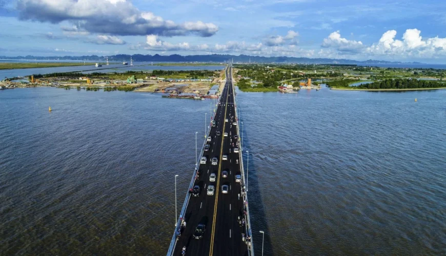 Bus crossing Tan Vu - Lach Huyen sea bridge on the way from Ninh Binh to Cat Ba Island