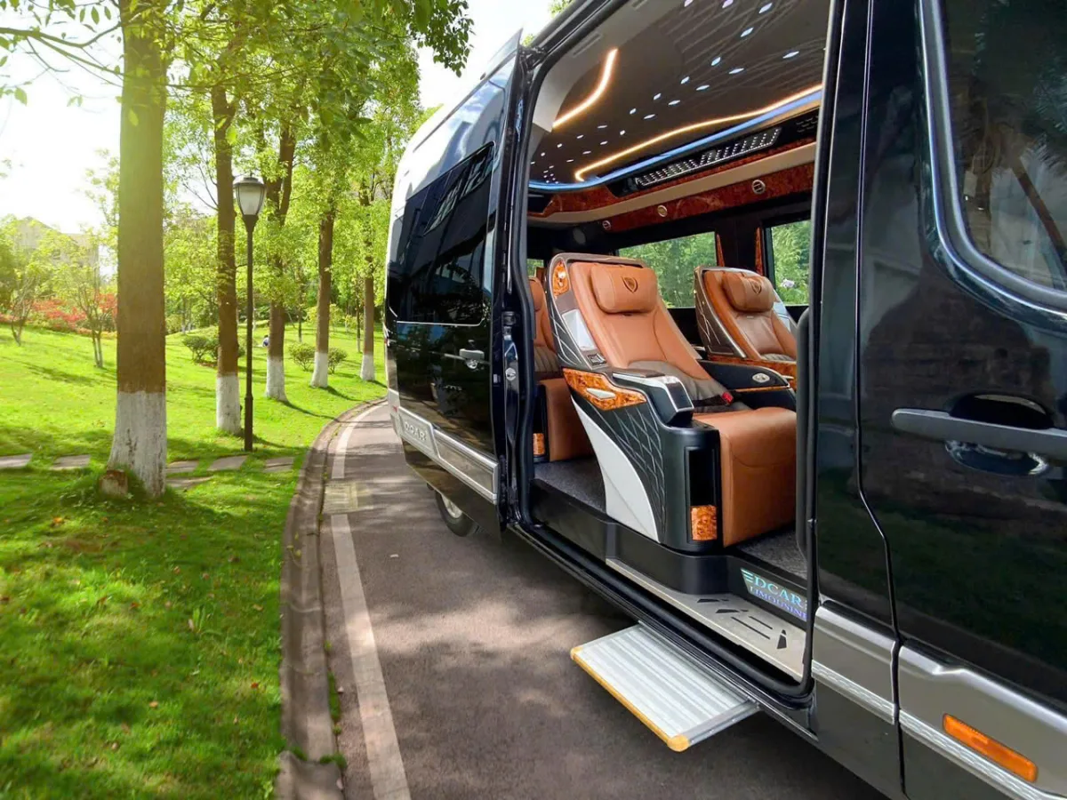 Luxury 9-seat Hanoi to Halong Bay Limousine van with premium black finish and professional door-to-door service