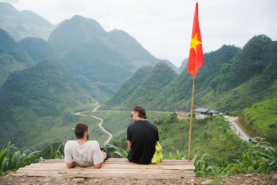 Adventure traveler enjoying the scenic Ha Giang Loop 3 day 2 night tour with a professional Easy Rider guide